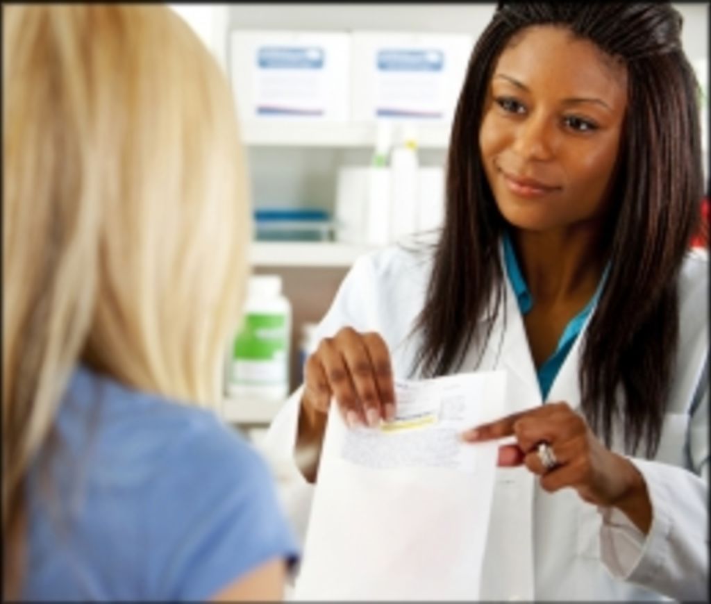 Pharmacist talking to patient