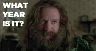 un homme avec des longs cheveux et une longue barbe dis "what year is it ?"