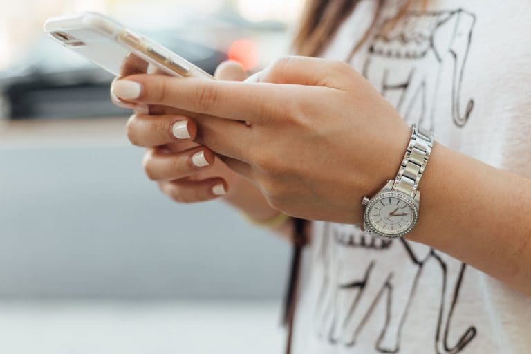 lady receiving push notification on phone