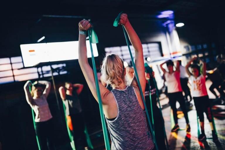group fitness class in a gym studio