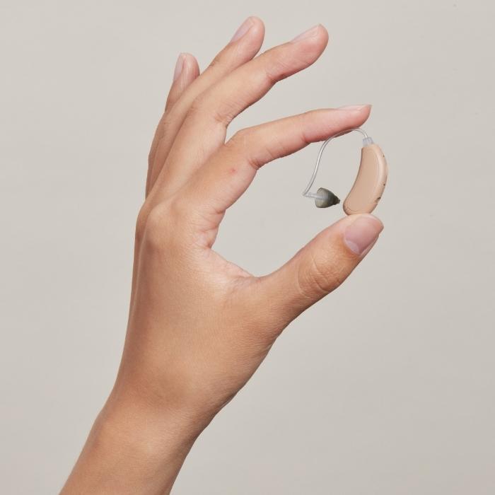 Hand holding Audicus DIA II