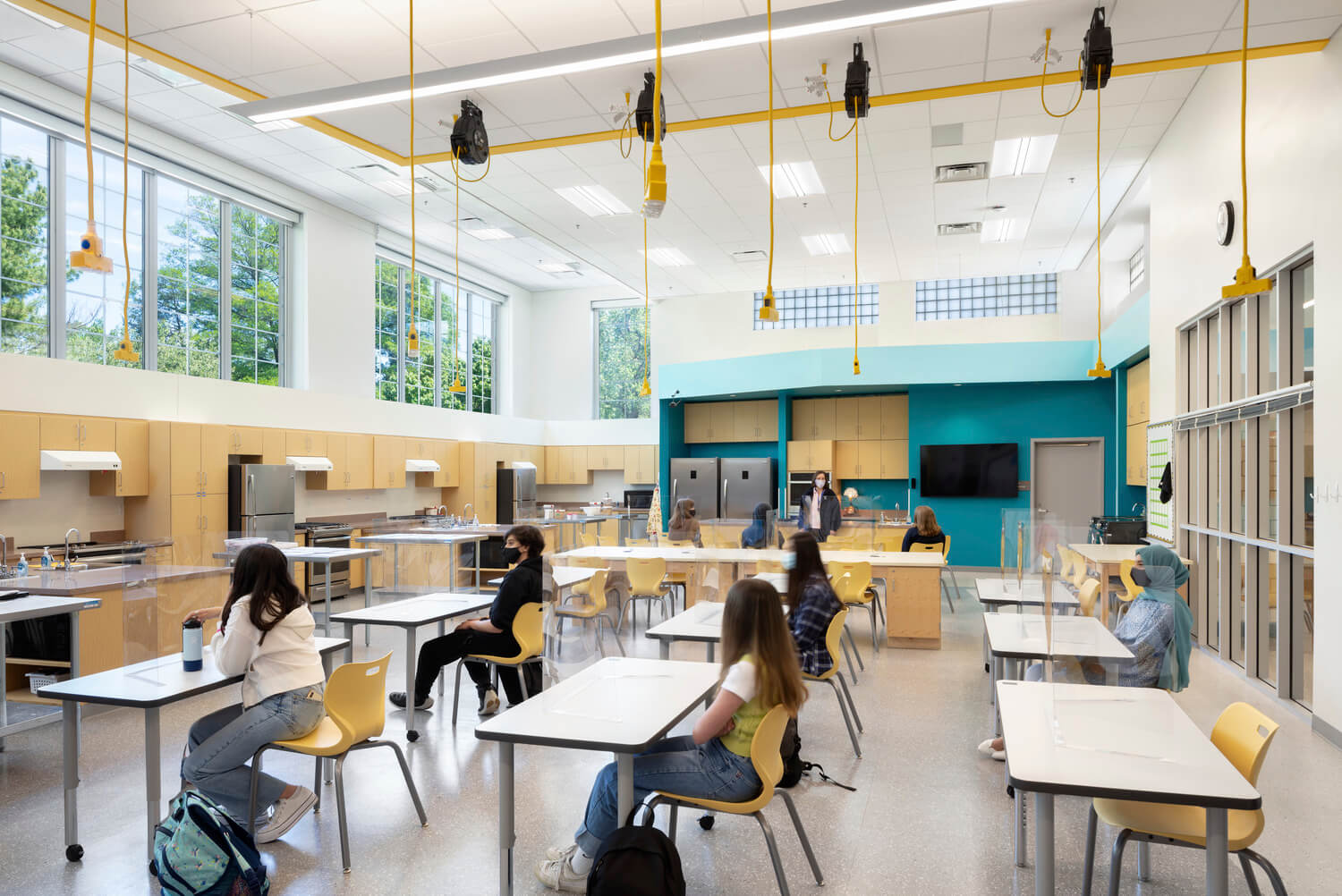 A photo of students sitting at desks in a lab.