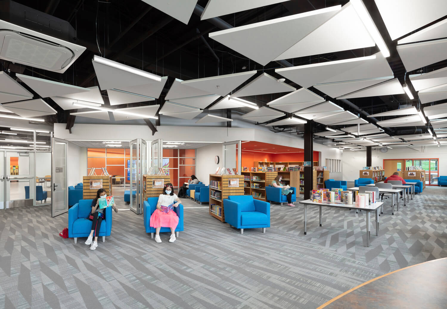 A photo of students reading in a school library.