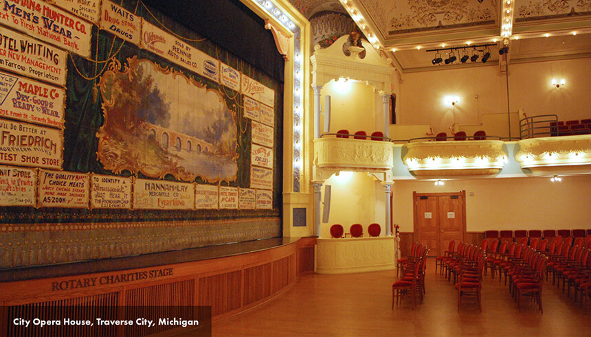 A photo of the interior of an historic theater labeled "City Opera House, Traverse City, Michigan"