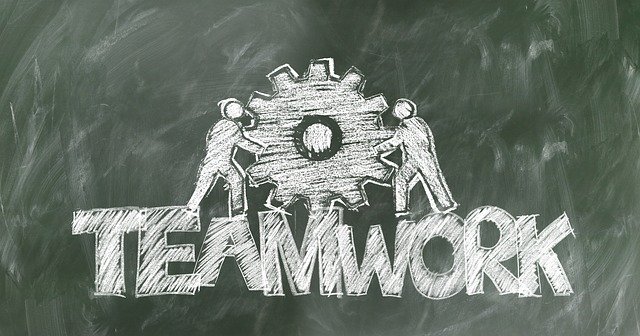 teamwork gear sign