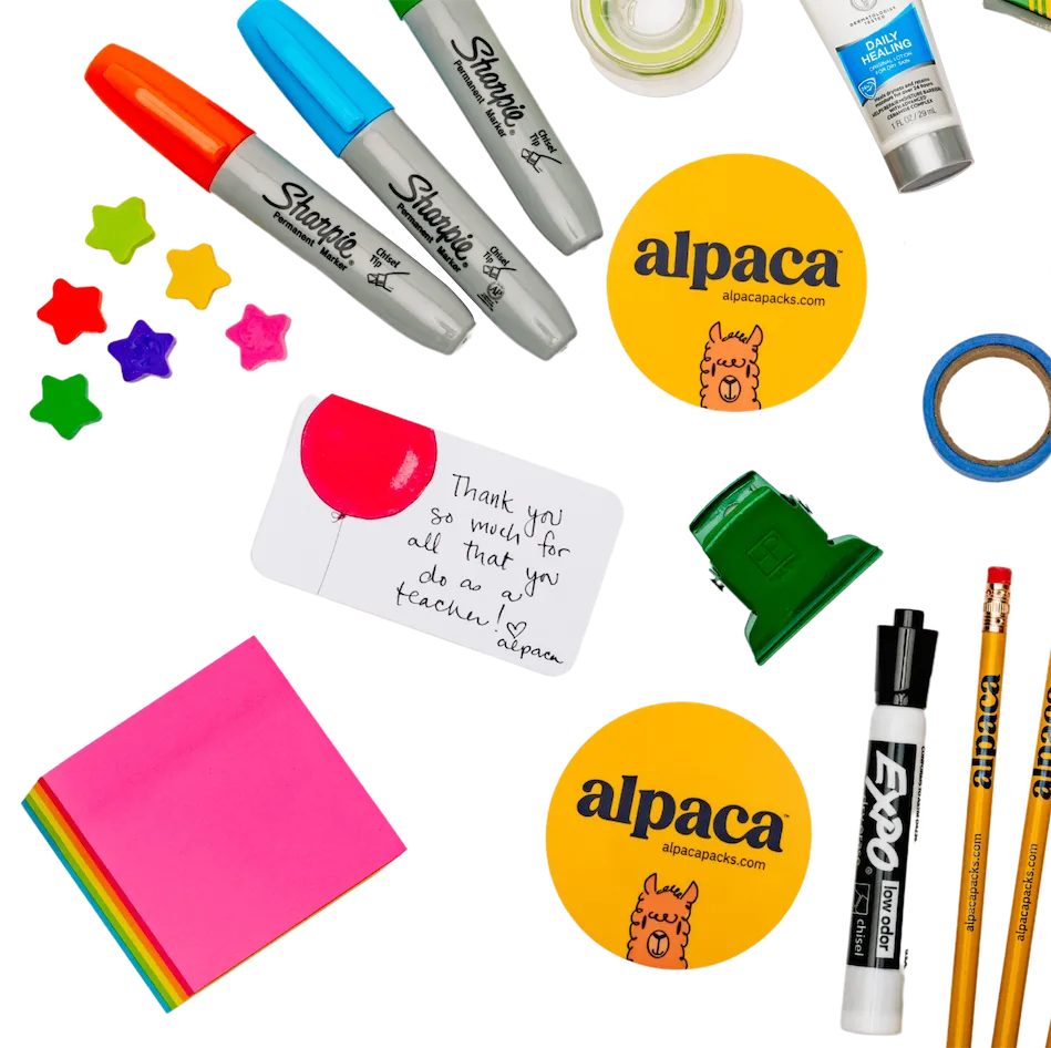 A photo of supplies that come in an alpaca pack. This includes markers, stickers, thank you notes, stickers, pencils, and more.u