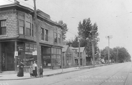Post's Drug Store & Mulder's Meat Market, Southwest Corner of Wealthy & Diamond, 1913