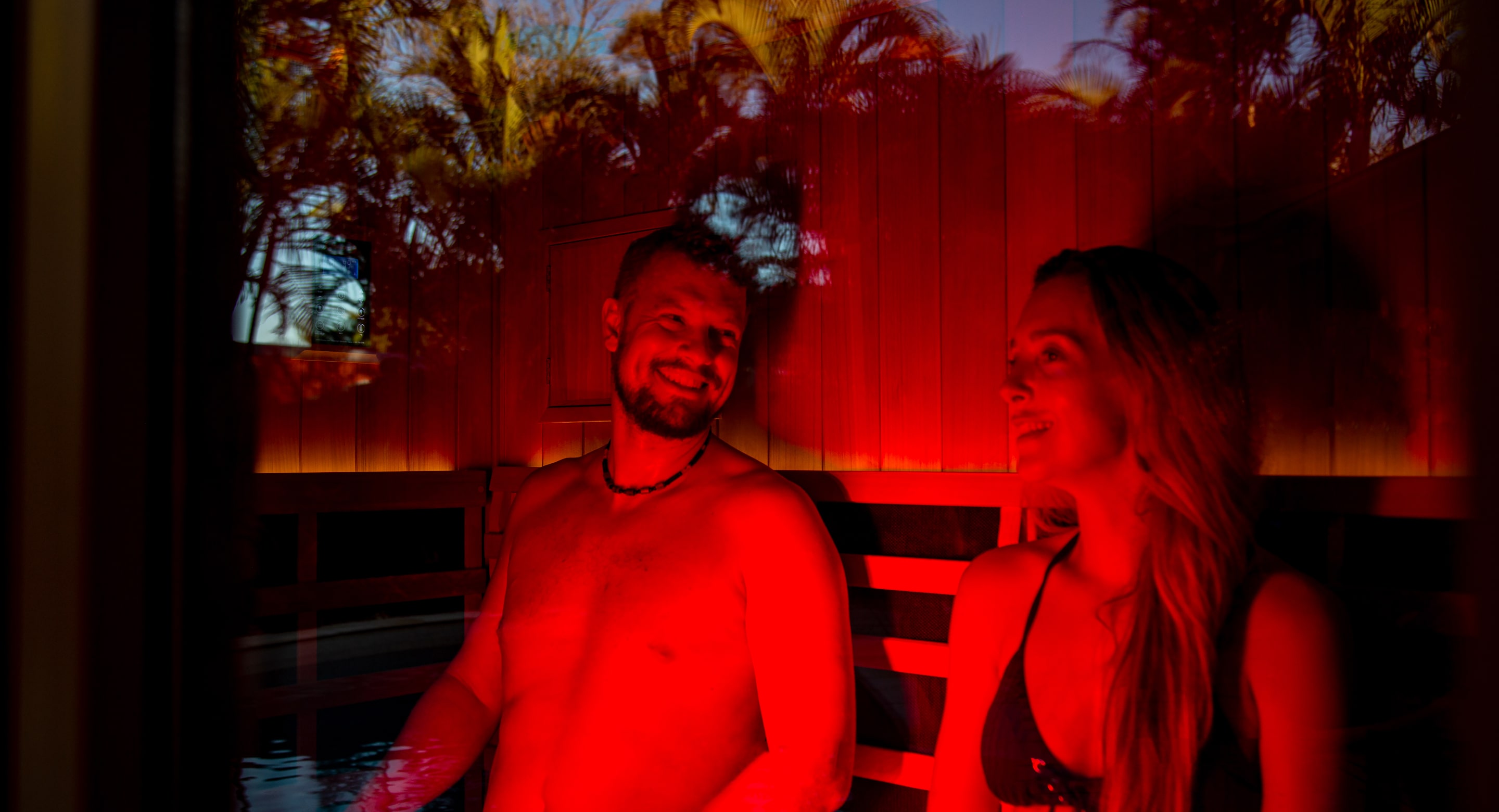 Couple in red light sauna