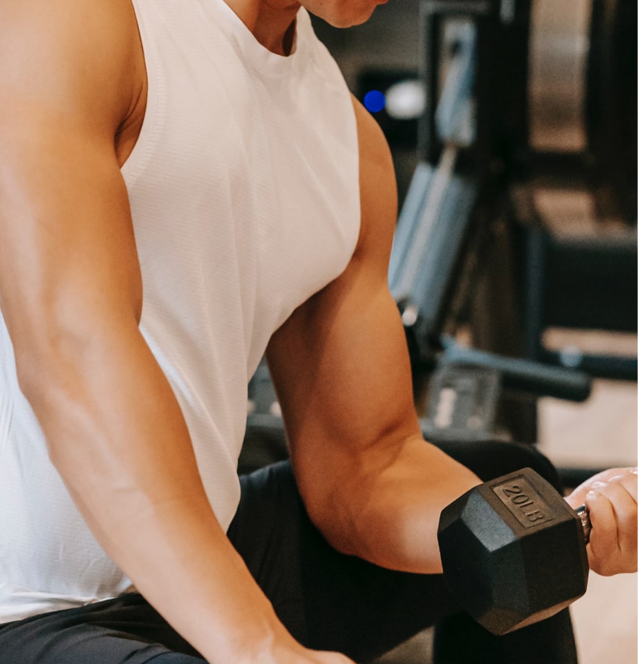 Man curling bicep weights