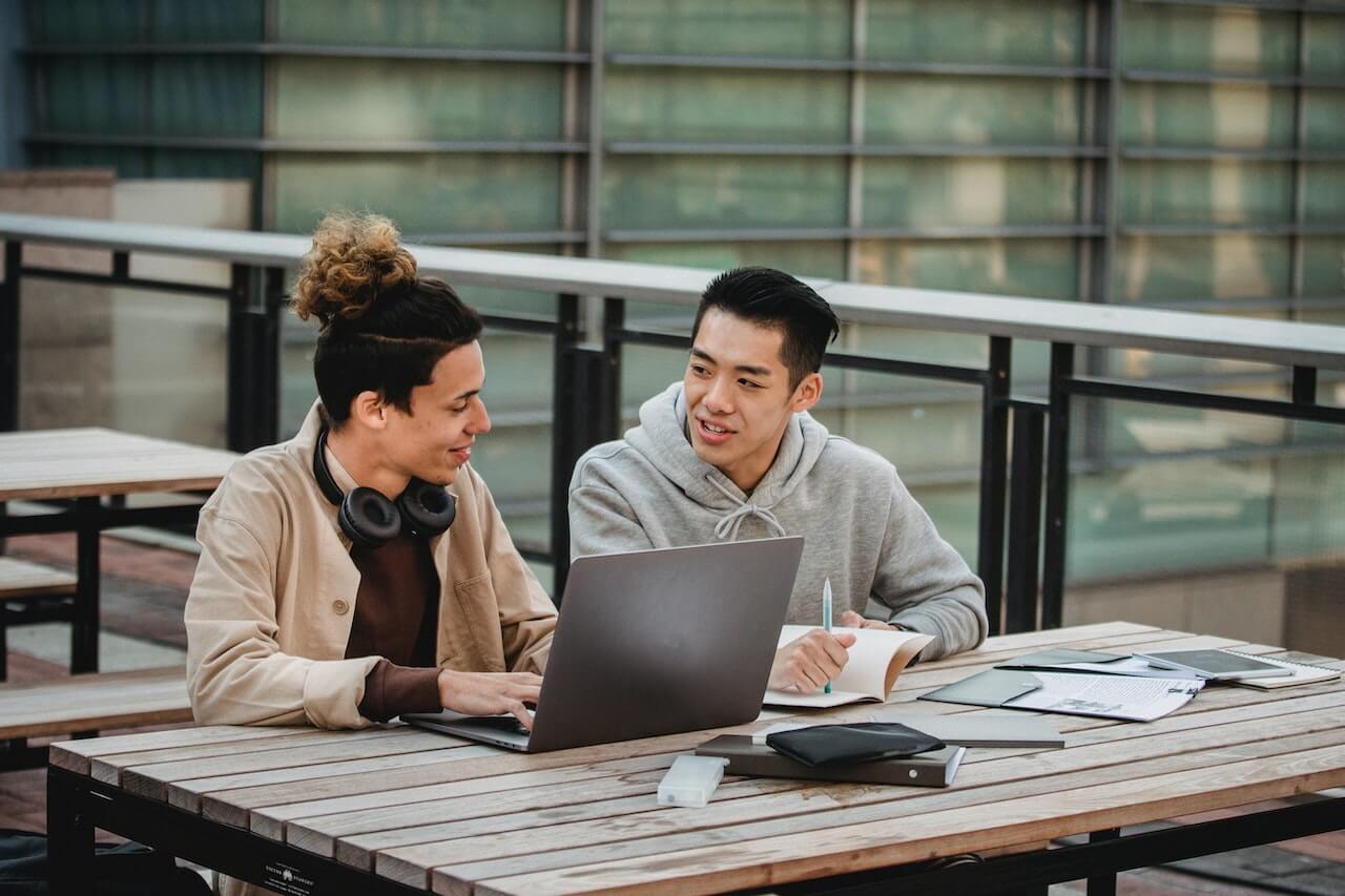 What Mental Health Resources are on HR’s Mind? - two workers collaborating outside of office