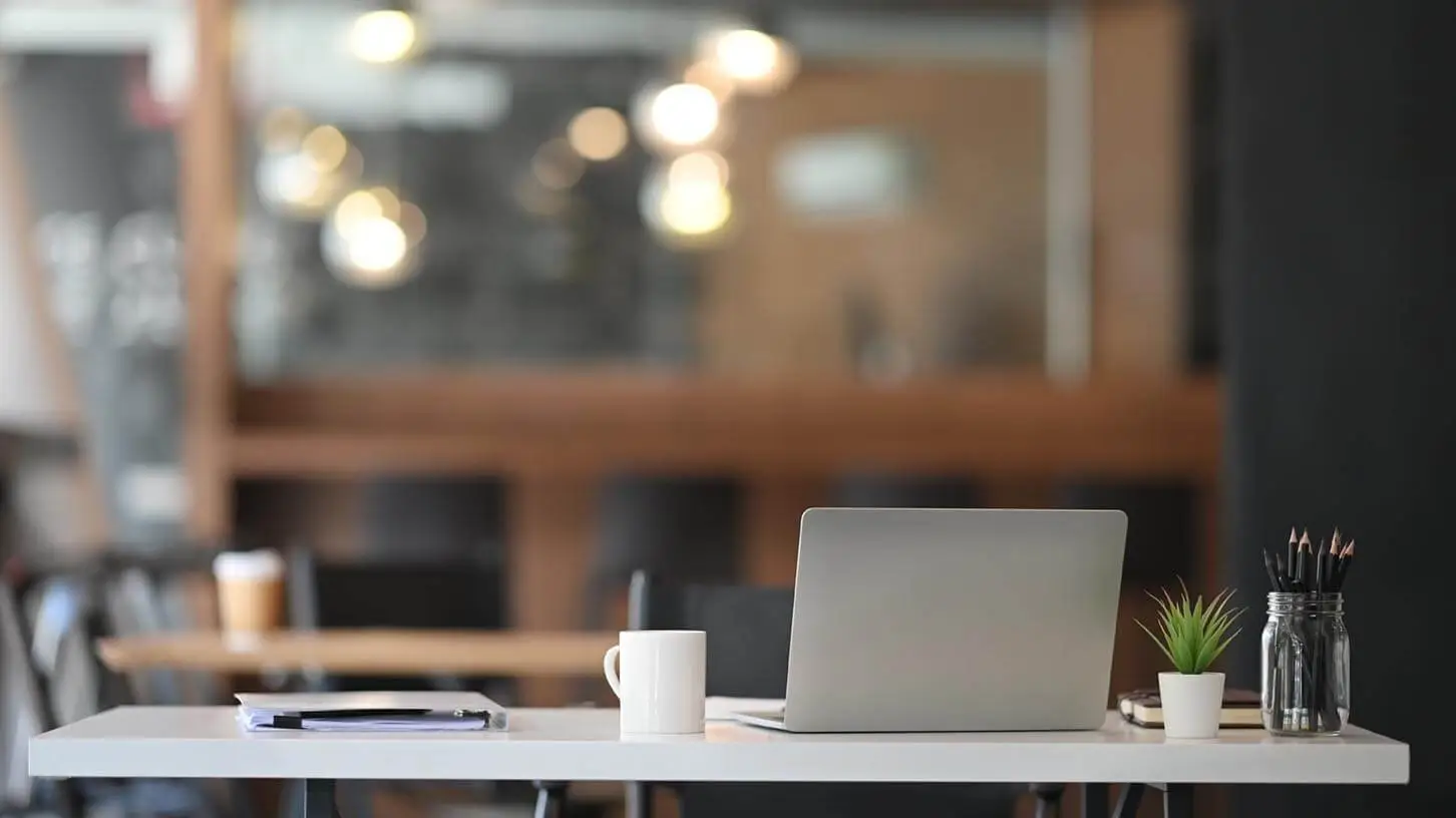 A laptop sitting on a desk