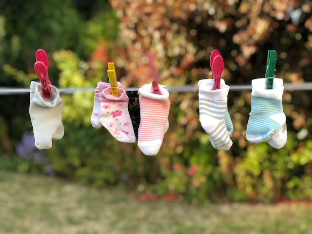 baby socks on a clothes line